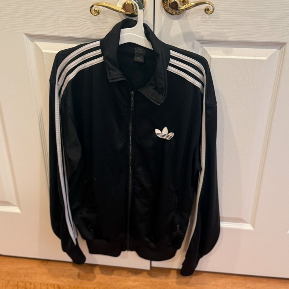 Adidas woman’s medium track suit jacket Medium